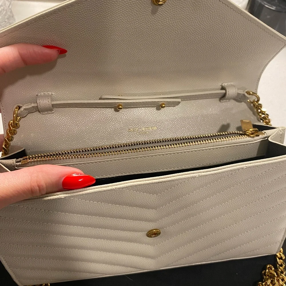 Yves Saint Laurent Ivory Quilted Crossbody with Gold Accents
Lightly used - Picture 3 of 6